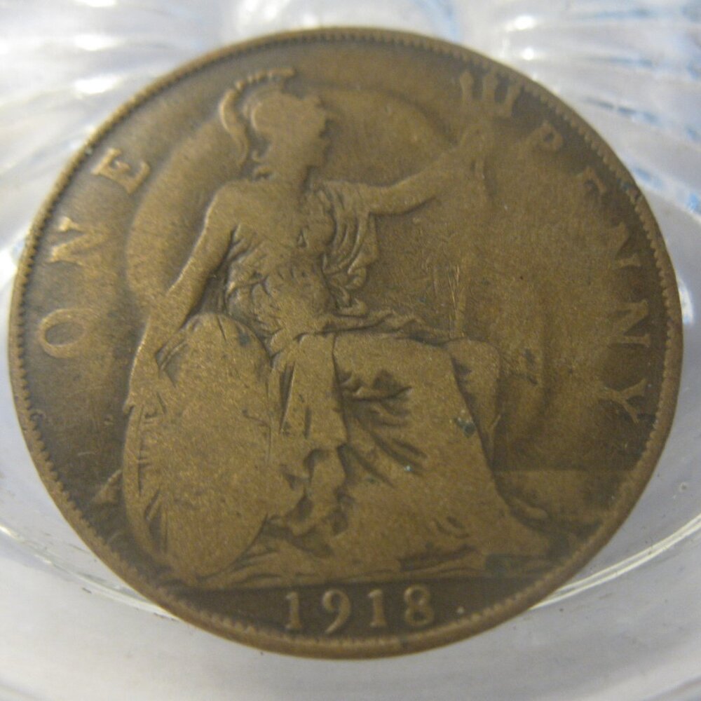 (FC-821) 1918 United Kingdom: One Penny { Halo effect obverse-to-reverse }